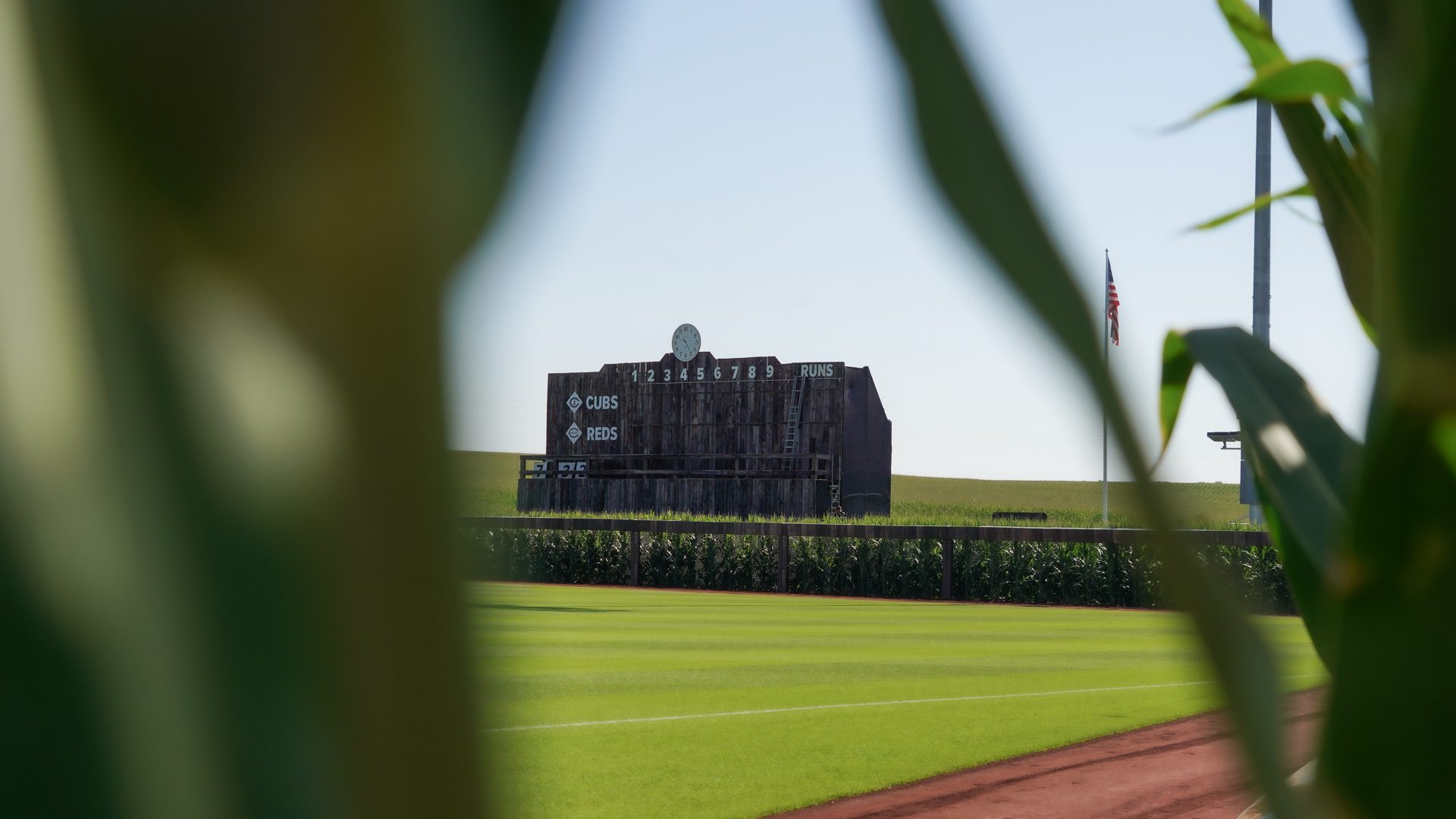 Wooden Scoreboard Through Corn 1