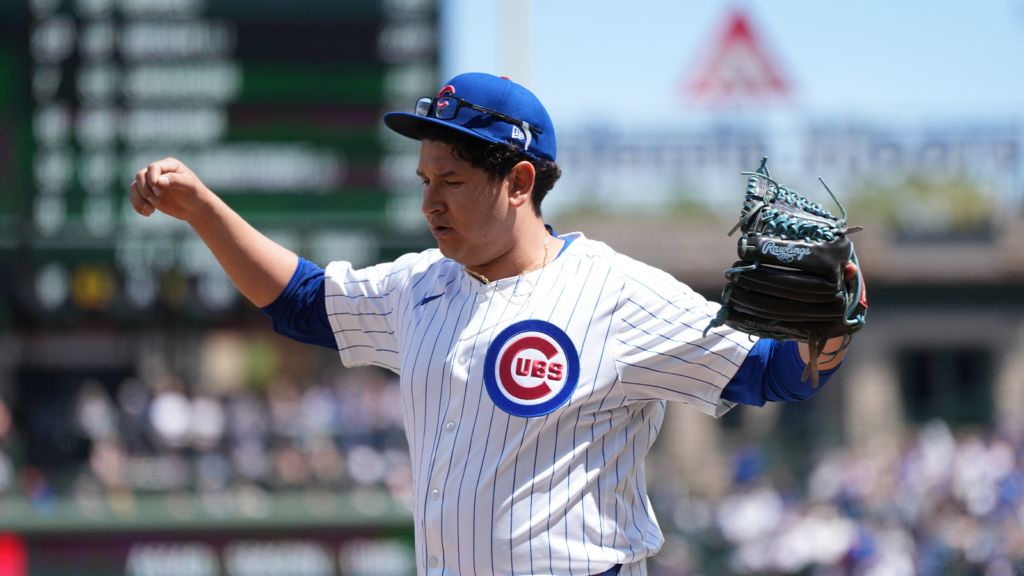 Javier Assad, patient offense help spark Cubs to win over division