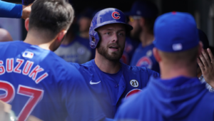 Michael Busch High Fives In Coors Field Dugout Pow
