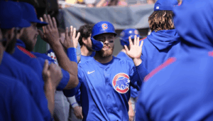 Michael Busch High Fiving Cubs Teammates In Pittsburgh Dugout