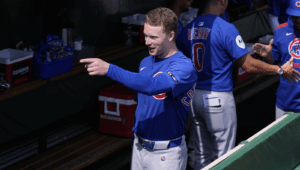Pca Smiling And Pointing In Cubs Dugout